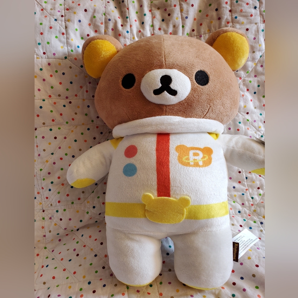 San-X Rilakkumma white space suit stuffed plush.